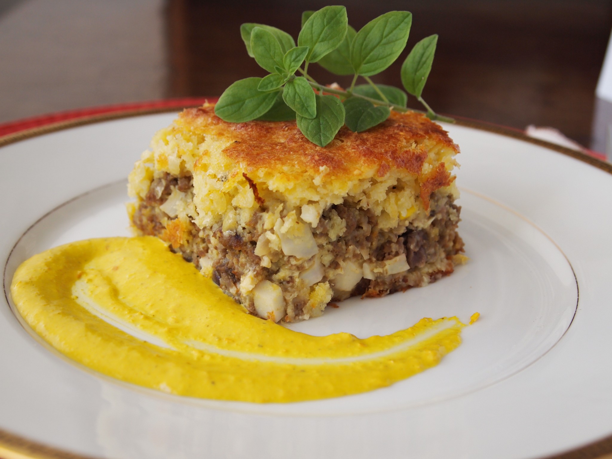 Corn pie, stuffed with beef, raisins, black olives and boiled eggs.