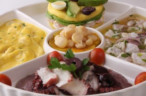 Piqueo Peruano - Ceviche, octopus in black olive sauce, tiradito, causa